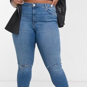 ASOS DESIGN Curve high rise ridley 'skinny' jeans in mid wash blue with rips